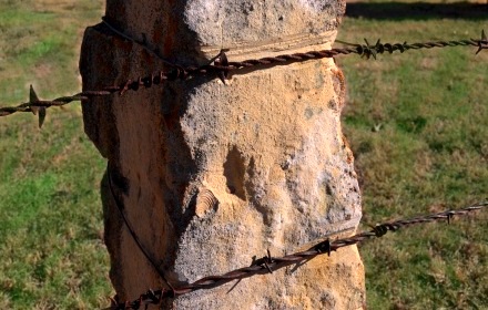 Limestone Post with Wire